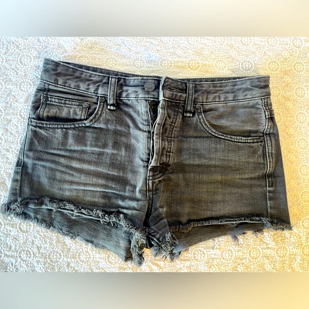 Free People black cut-off shorts, size 25; distressed black denim with raw hem